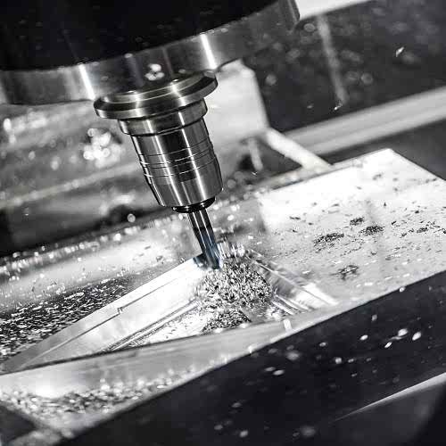 Metalworking CNC milling machine. Cutting metal modern processing technology. Small depth of field. Warning - authentic shooting in challenging conditions. A little bit grain and maybe blurred.